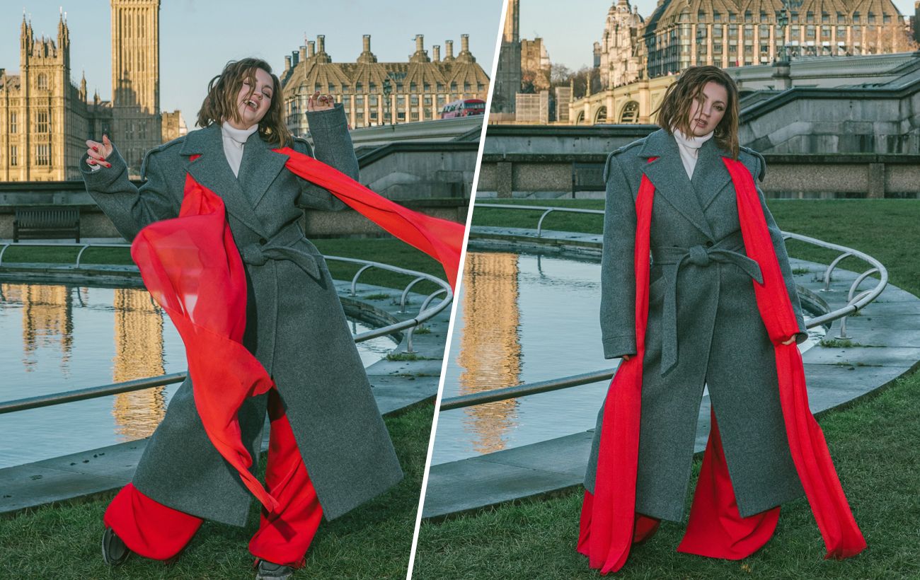 Сіре пальто й червоний акцент: стильний лондонський образ Олі Цибульської